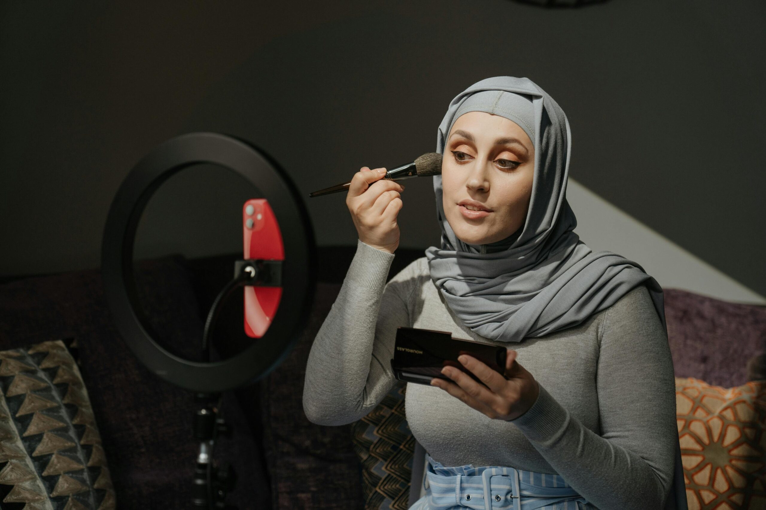 Influencer demonstrating bold eyeshadow tutorial