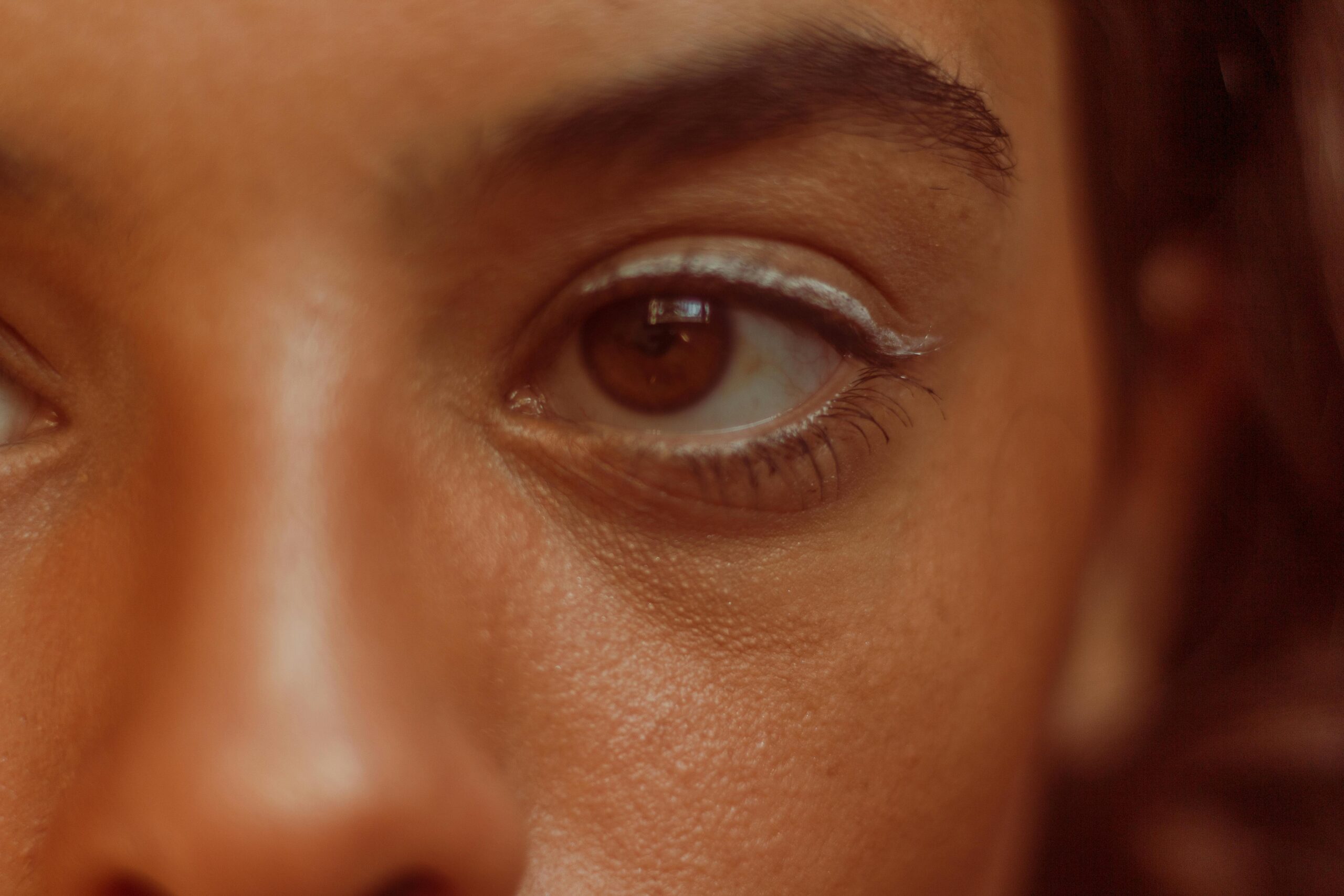 Monochrome makeup look featuring rose gold tones