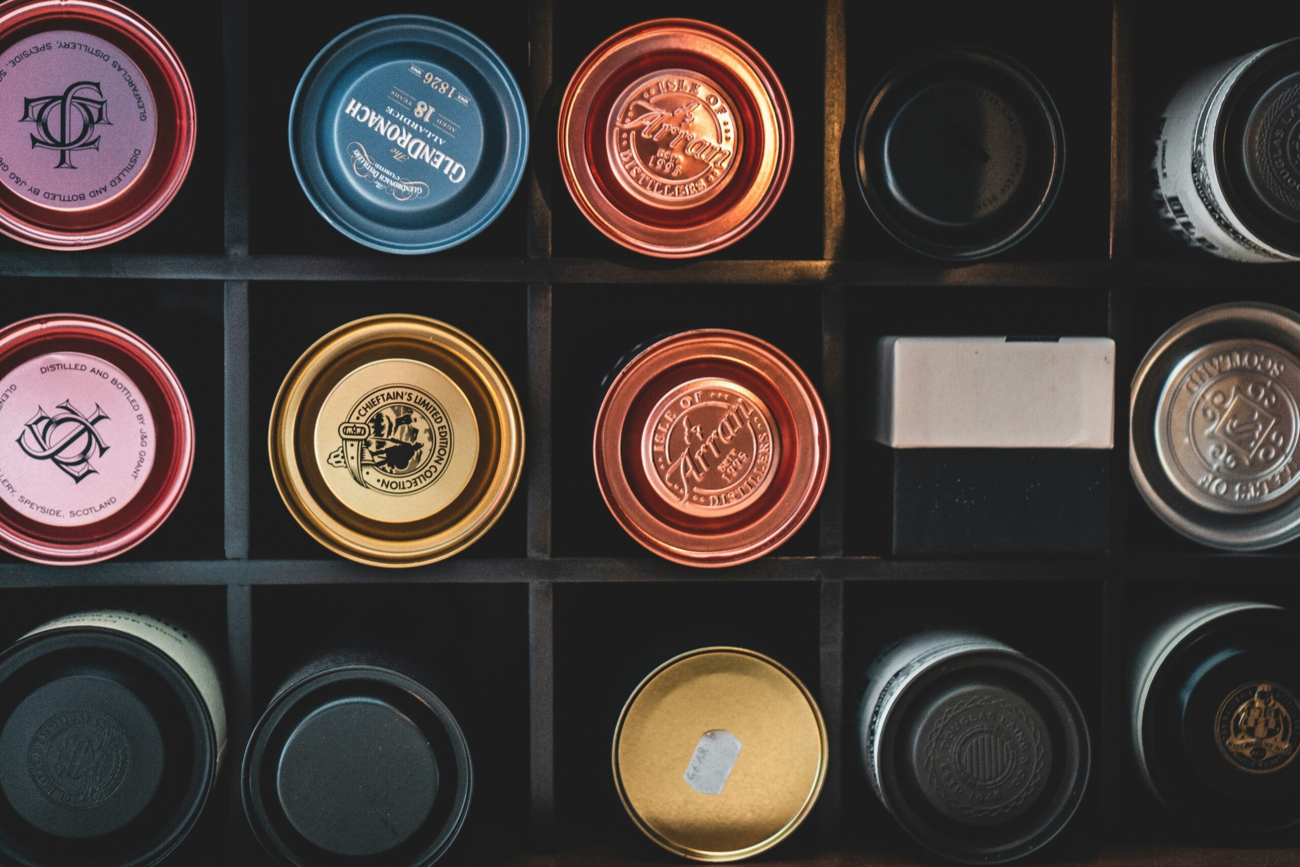 A close-up shot of a high-quality full coverage makeup palette on a marble counter.