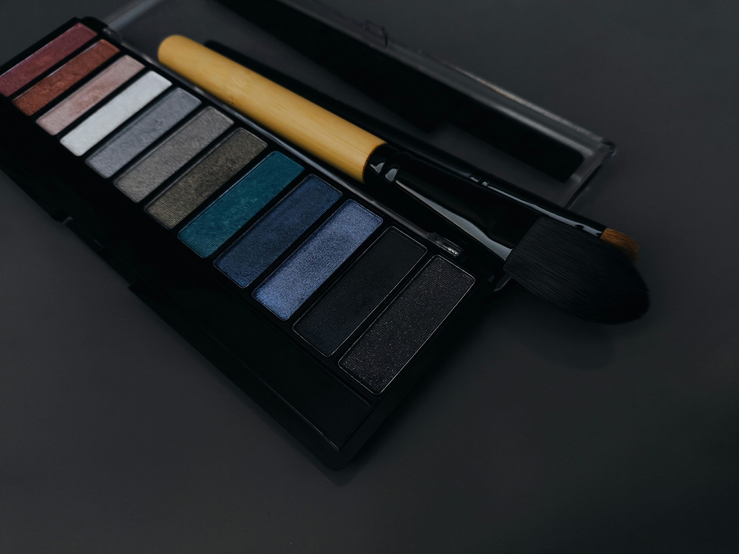A messy makeup bag filled with individual products